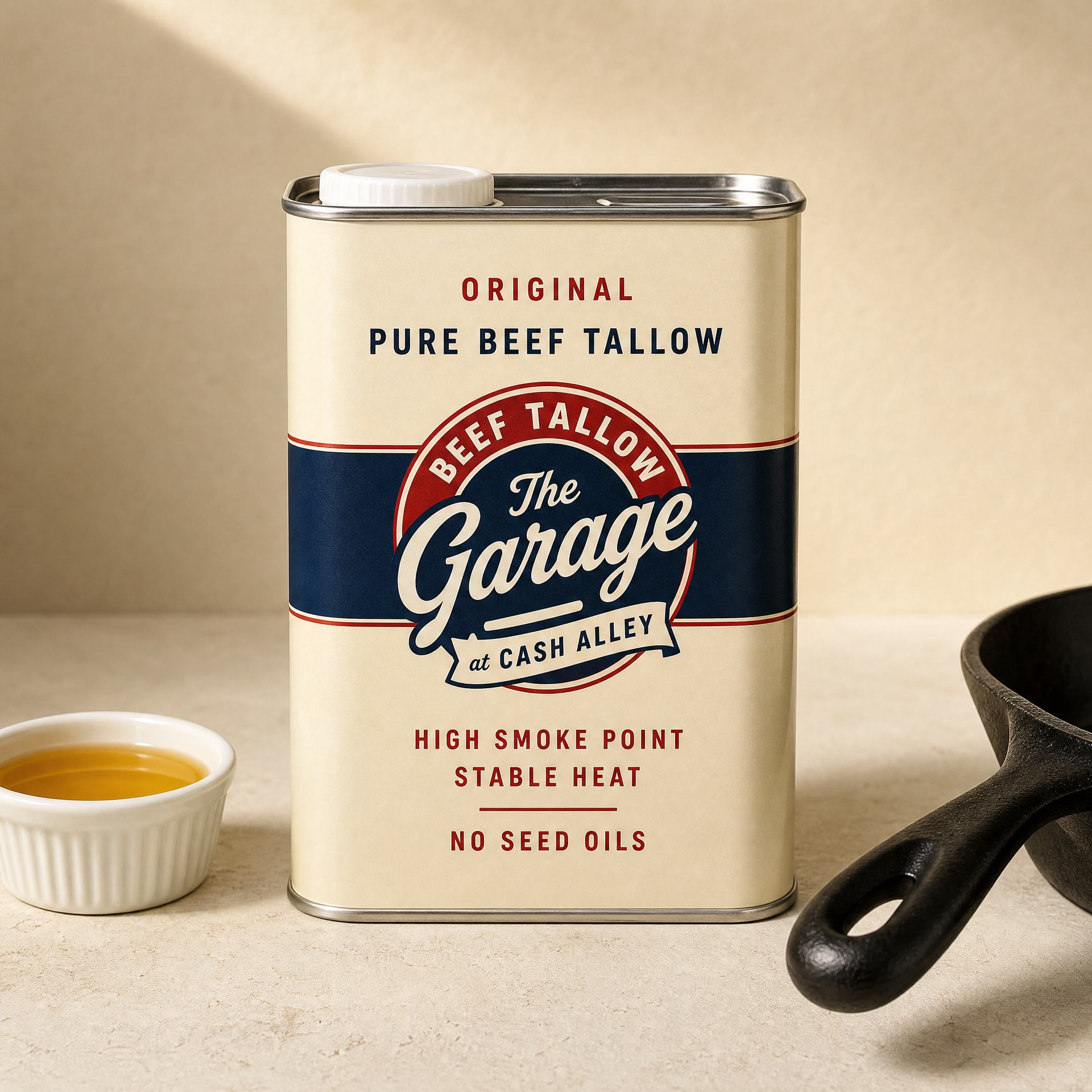 Original Tallow Cooking Oil 16 fl oz tin beside a small dish of golden liquid beef tallow